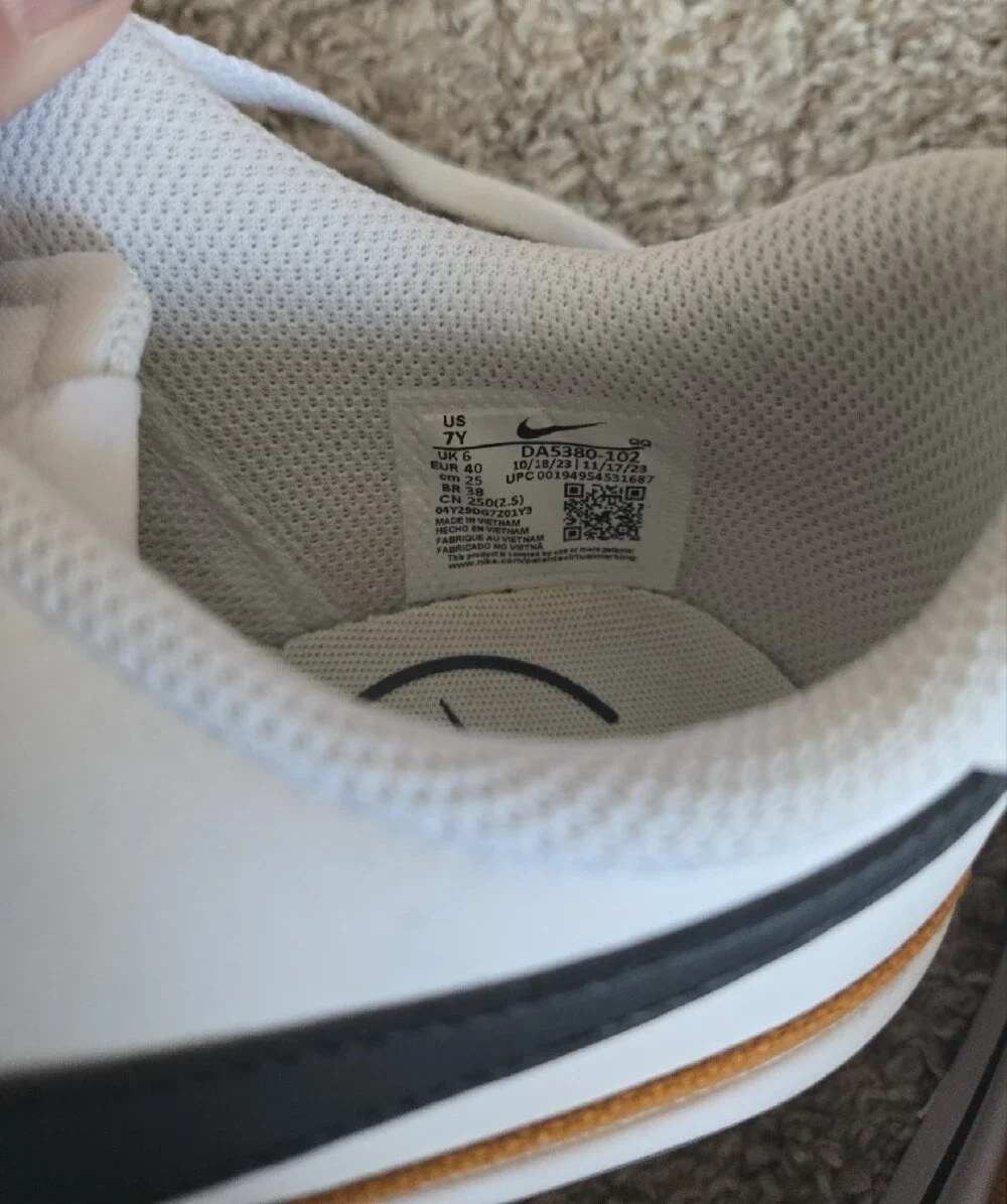 Nike KidsWhite Sneakers with Black Swoosh and Brown Trim